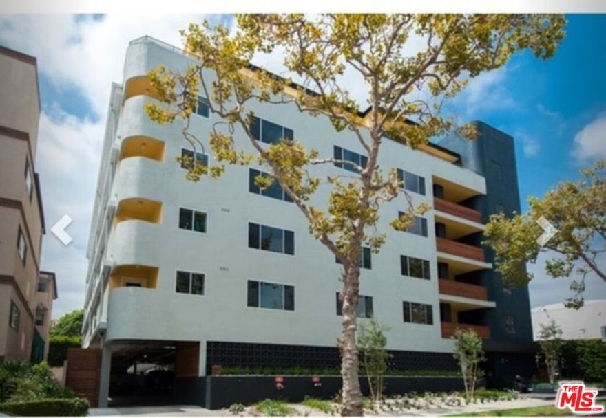 Luxury living in the heart of Beverly Hills!  Located walking distance to all luxury stores and 5 star restaurants.  This completely remodeled unit has hardwood floors through out and bright open floor plan. Including gourmet kitchen with top of the line appliances.  Living here can make being home an exceptional experience.