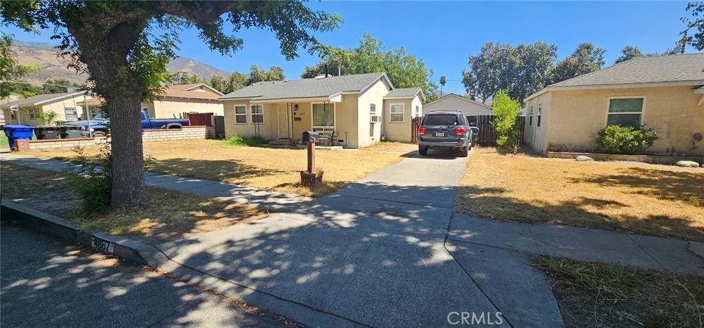 Charming 2-Bedroom Home with Workshop (that can be converted into an ADU), Detached Garage & Endless Potential!
Welcome to this inviting 2-bedroom, 1-bath home located on a spacious lot in a prime California location—just minutes from CSUSB and with quick access to the 210, 215, and 18 freeways. This property is full of charm, character, and incredible potential! Step into the warm and welcoming family room, natural light pours in through large windows, brightening the home and enhancing its cozy atmosphere. The second family room is featuring vaulted ceilings with stunning exposed wood beams and a beautiful fireplace that creates the perfect space to relax, entertain or even be made into the ultimate master bedroom. With two other nice size rooms you will have plenty of space. Outside, enjoy morning coffee or evening sunsets on the beautiful front porch, and take advantage of the generously sized backyard—ideal for gardening, gatherings, or expanding your living space. A standout feature is the large workshop and detached garage—offering endless possibilities! Whether you're a hobbyist, need extra storage, or are looking for an excellent ADU (Accessory Dwelling Unit) conversion opportunity, this space is ready to become whatever you dream it to be. Located near convenient shopping, dining, and outdoor recreation, this home combines location, charm, and flexibility—perfect for first-time buyers, investors, or anyone looking to customize their ideal living space. Don’t miss out—make this your dream home today!