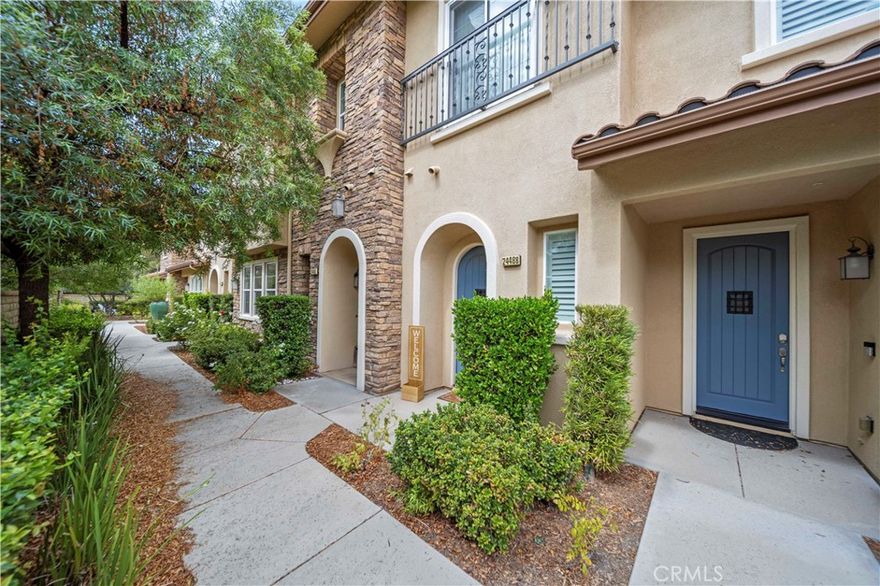 Welcome to 24488 Marzal Street, nestled in the highly sought after West Creek community. Renowned for its top-rated schools and resort-style amenities. This beautifully maintained two-bedroom condo feels like new, showcasing brand-new carpet and fresh interior paint throughout. The open-concept layout seamlessly connects the living, dining, and kitchen areas, creating the perfect space for everyday living and entertaining. Just off the dining area, a private patio extends your living space outdoors. The thoughtfully designed split-level bedrooms offer both comfort and privacy. The primary suite features a spacious walk-in closet, an en-suite bathroom, and an adjacent loft area, ideal for a home office, reading nook, or cozy retreat. An attached two-car tandem garage provides convenience and direct access. Living in West Creek means more than just a home, it’s a lifestyle. Enjoy the community’s beautifully maintained parks, sparkling pool, rejuvenating spa, and elegant clubhouse. With shopping, dining, and freeway access just moments away, this condo offers both comfort and convenience in one of Santa Clarita’s most desirable neighborhoods. BONUS!! NO MELLO ROOS ON THIS UNIT!!