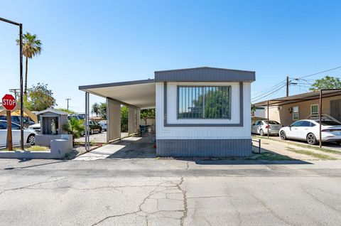 Photo of 49615 Cesar Chavez Street #69, Coachella, CA 92236 (MLS # 219147702DA)