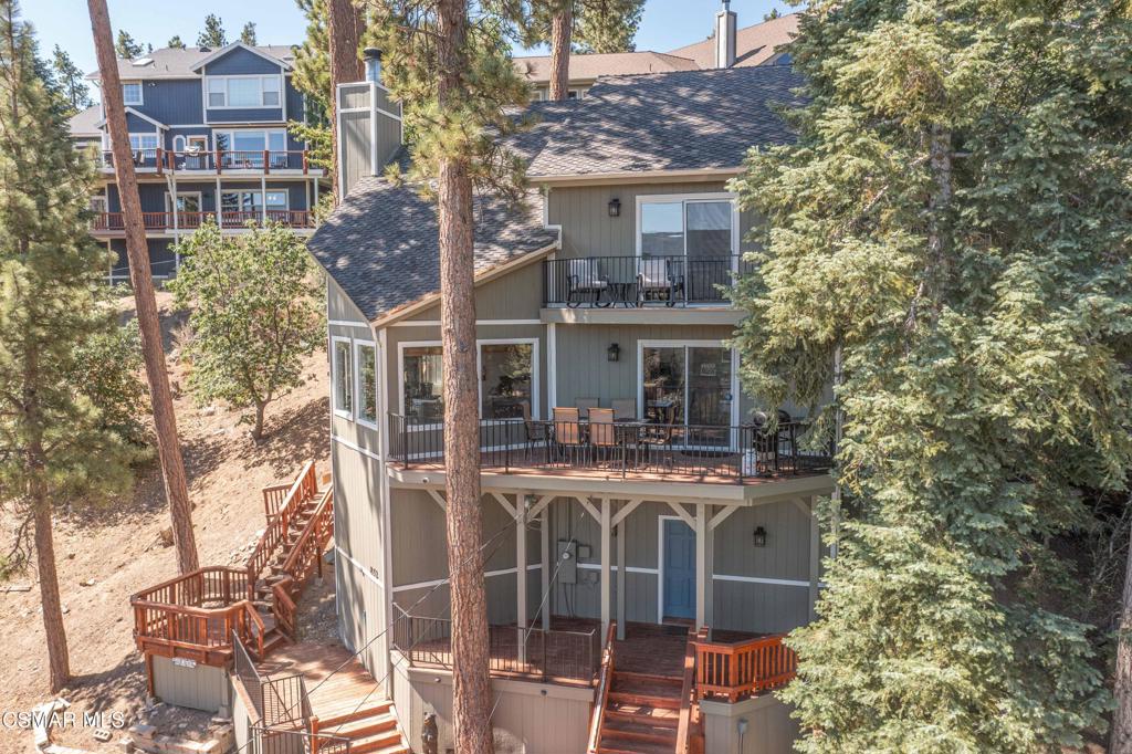 SPECTACULAR LAKE VIEWS! - Experience the best of mountain and lake living in this beautifully appointed 3-bedroom, 2-bath home, offering over 2,100 sq. ft. of well-designed living space and panoramic lake views from nearly every room--including the living area, kitchen, primary suite, and even the outdoor spa.Step outside to discover multiple decks and outdoor sitting areas, ideal for morning coffee, afternoon lounging, or an evening meal while enjoying the serene views of the lake and surrounding mountains. Whether you're entertaining guests or unwinding solo, these outdoor spaces offer the perfect mountain backdrop.Located just a short distance from The Village, you'll have easy access to Big Bear's best restaurants, shops, and entertainment--all while enjoying the quiet, peaceful setting this home provides. Currently operating as a vacation rental, this property brings income potential with an established rental history--perfect for investors or those seeking to offset ownership costs. The home also includes a large build-up area, offering potential for an additional bedroom, game room, or custom bonus space--tailor it to your needs and maximize its value. Whether you're looking for a full-time retreat, part-time getaway, or income-producing property, this rare lake view gem delivers on location, lifestyle, and opportunity. Don't miss your chance to own a thriving mountain escape in one of Big Bear's most desirable lakeview neighborhoods!