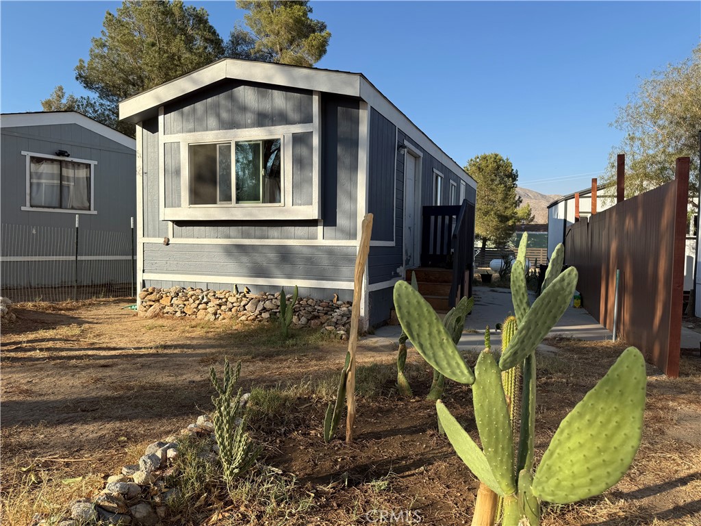 This great little house is in the Butterfield Ranch RV and Trailer community on the Great Overland Stage Route of 1866. You own the home, and enjoy this remote desert location in the desert region of Julian's backcountry. Space rent is $500/month, and you have metered water, power, and propane available. Three swimming pools on site, clubhouse and bbq area for gatherings, laundry facilities, mail delivery, small country store, sweet neighbors and incredible views are all you need. Home is in good condition and being sold as-is. Financing is available.