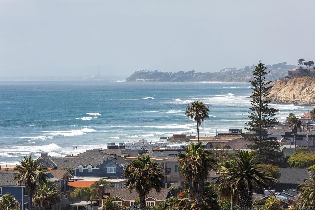 California Dreaming! Race to secure this spectacular Del Mar Beach Colony rental, offering breathtaking Pacific Ocean whitewater and coastline views! This top-floor unit features 1 bedroom (king bed), 2 bathrooms, and a comfortable sleeper sofa. The chef’s kitchen, upscale finishes, and stylish furnishings create an inviting atmosphere, complemented by 3 TVs and an ocean-view balcony off the living room. One of the few units with A/C, it also boasts an interior washer/dryer, a main bath with a walk-in shower, and dual vanity sinks. Enjoy a premier location nestled between the beach, Powerhouse Park, and the luxurious L'Auberge Del Mar Resort. As a tenant, you’ll have access to the Resort's amenities, including a heated pool, jacuzzi, tennis courts, and a fitness center. Parking is a breeze with 3 spaces—1 reserved underground and 2 exterior. This unbeatable location places you just steps from the village, park, beach, and ocean. Available for short-term rentals with a one-month minimum. Rates vary by season. Call Cheri for more details!