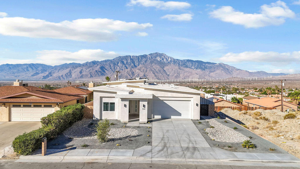 This brand new home in Desert Hot Springs features four bedrooms and two and a half modern bathrooms. It offers breathtaking views overlooking the Coachella Valley, providing a perfect blend of comfort and natural beauty. This home is ideal for enjoying stunning sunsets and serene morning.