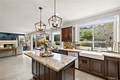 Photo of 27041 Ironwood Drive Dr, Laguna Hills, CA 92653 (MLS # OC25195151)