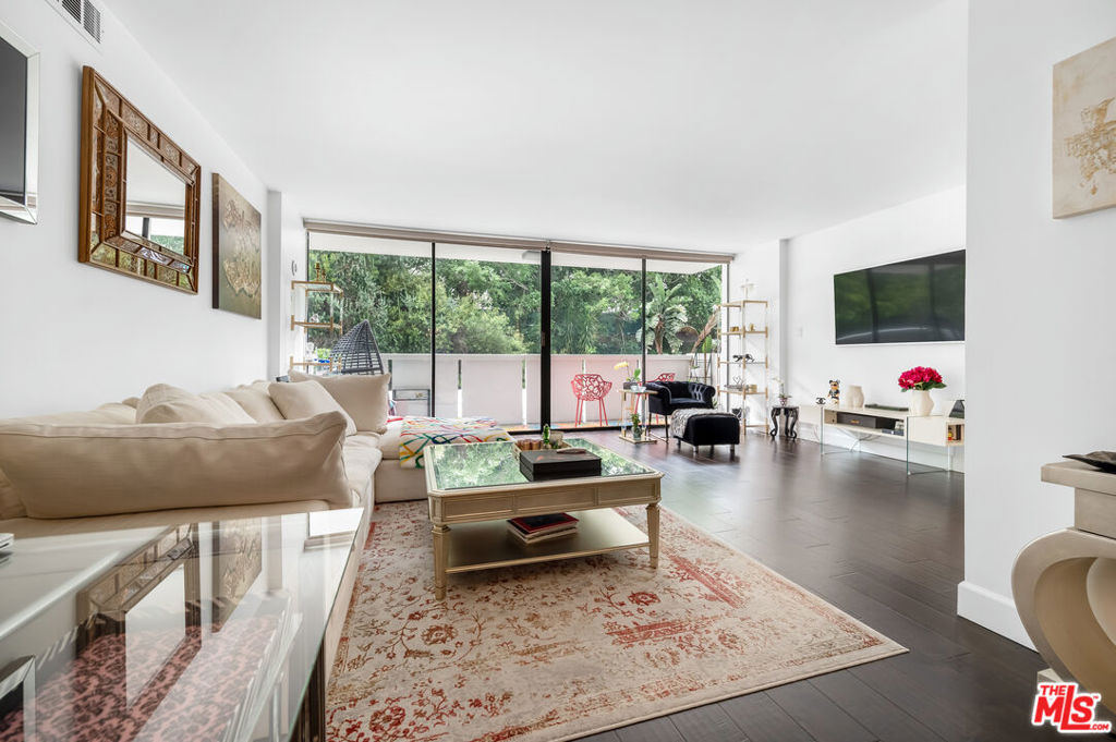 This beautifully renovated condo is one of the best values in the building, showcasing premium flooring, refined wall treatments, and brand-new appliances. Nestled in a prestigious high-rise in the heart of the Hollywood Hills, the residence delivers convenient access to some of the area's top attractions. Residents benefit from a range of upscale amenities, including 24-hour concierge service, valet, a doorman, a cutting-edge fitness and wellness center, plus a resort style pool and spa. The spacious 1-bedroom, 1-bath layout features a private balcony, custom lighting, and ample closet space, blending sophistication with everyday comfort. HOA fees cover water, power, cable, and internet and earthquake insurance. Offering a truly turnkey living experience.