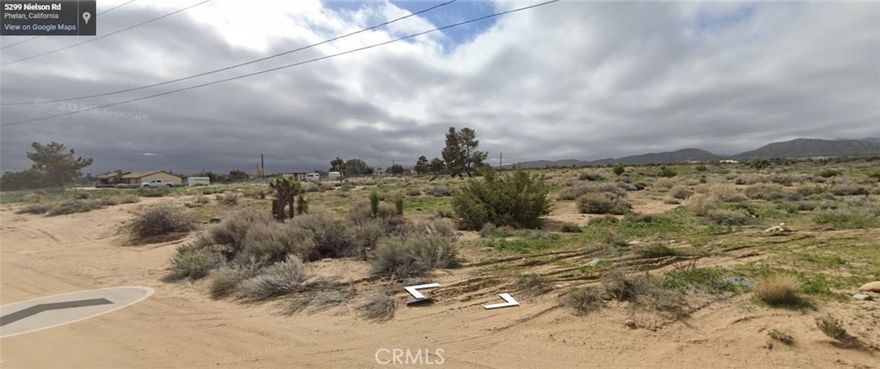 WATER METER ON SITE. Flat, usable lot in desirable SOUTH PINON HILLS near Serrano High School. There was once a home on the property. Water main and electric poles run along Nielson Rd.; contact Sheep Creek Water Company and So. Cal. Edison for more info on utility connection charges. Fast growing area; build or hold for appreciation!