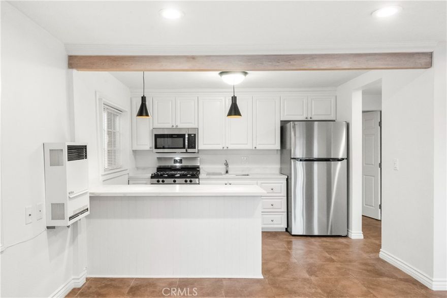 Experience luxury coastal living in this completely remodeled and redesigned 1-bedroom apartment on the iconic Cliff Drive in Laguna Beach. Formerly a 2-bedroom layout, this spacious 900 sq. ft. residence has been thoughtfully converted into an expansive 1-bedroom home, offering a bright, open living experience just steps from the beach and the heart of Downtown Laguna.Inside, the home features brand-new appliances, modern finishes, and a clean, contemporary aesthetic throughout. Large windows fill the space with natural light while framing serene ocean views that capture the charm of Laguna’s coastline. The upgraded kitchen includes sleek countertops, new cabinetry, and premium appliances, perfect for cooking and entertaining.Enjoy the true Laguna lifestyle with your own front patio, ideal for relaxing outdoors, taking in the coastal air, or enjoying morning coffee before strolling to the sand. Situated on prestigious Cliff Drive, this address places you within effortless walking distance of the beach, Heisler Park, world-class restaurants, boutique shopping, cafes, and art galleries.This beautifully updated beachside rental blends style, comfort, and unbeatable walkability, an exceptional opportunity in one of Laguna Beach’s most sought-after neighborhoods.Highlights:
• 900 sq ft completely remodeled
• Originally a 2-bedroom, now a spacious open 1-bedroom layout
• Ocean view
• New appliances throughout
• Private front patio
• Walk to the beach, Heisler Park & Downtown Laguna Beach
• Premier location on famous Cliff Drive