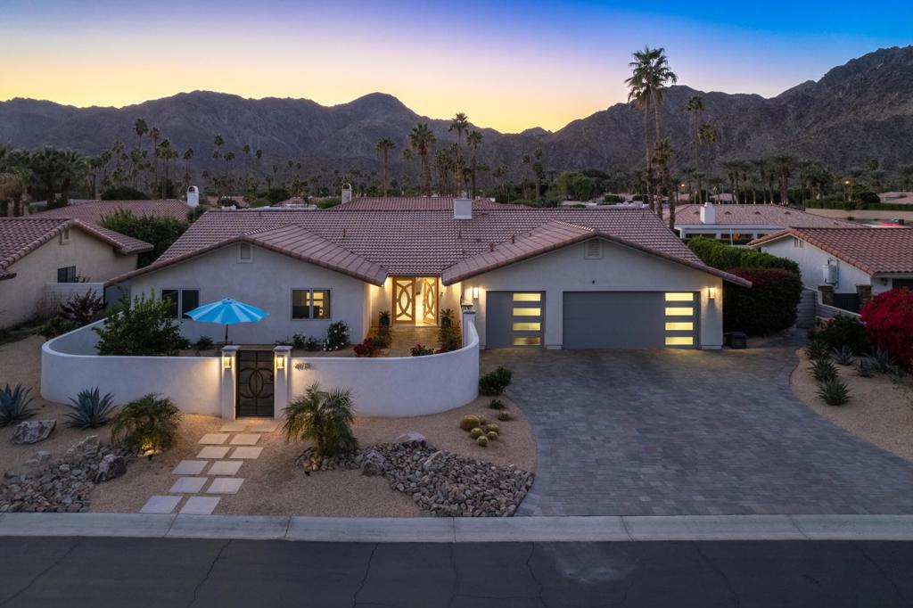 Welcome to your dream home at 48701 San Pedro Street in the heart of La Quinta Golf Estates.  This stunning 3-bedroom, 3.5-bathroom residence, completely remodeled in 2023, epitomizes modern luxury and seamless indoor/outdoor living. Spanning 3,198 square feet on an expansive 11,325 square foot lot, this home is designed to capture the breathtaking views of the Santa Rosa Mountains. Large 2'x4' porcelain tile floors flow throughout the common areas, enhancing the open and airy feel of the great room, which boasts a cozy fireplace, and opens to the dining and kitchen area.  The highly upgraded kitchen is a chef's delight, featuring double islands with quartzite waterfall countertops, stainless steel Wolf 6-burner cooktop, hood, & Wolf double ovens. A SubZero Column refrigerator & freezer, dual dishwashers, and an ice machine complete this culinary haven. Two impressive 16-foot stackable glass doors connect the indoor/outdoor living.  Indulge in the new large pool and spa, built-in BBQ, and lush, low-maintenance landscaping. The primary suite is a private retreat with an additional 12-foot stackable glass patio door, dual vanities, an oversized shower, and a spacious walk-in closet. Additional features include private courtyard entry, upgraded on-suite bathrooms & showers, air conditioned 2-car + golf cart garage with epoxy floors & storage, new electrical and plumbing, LED lighting, 7'' base molding, central vacuum, tankless water heater, new 3-zone HVAC, and much more.