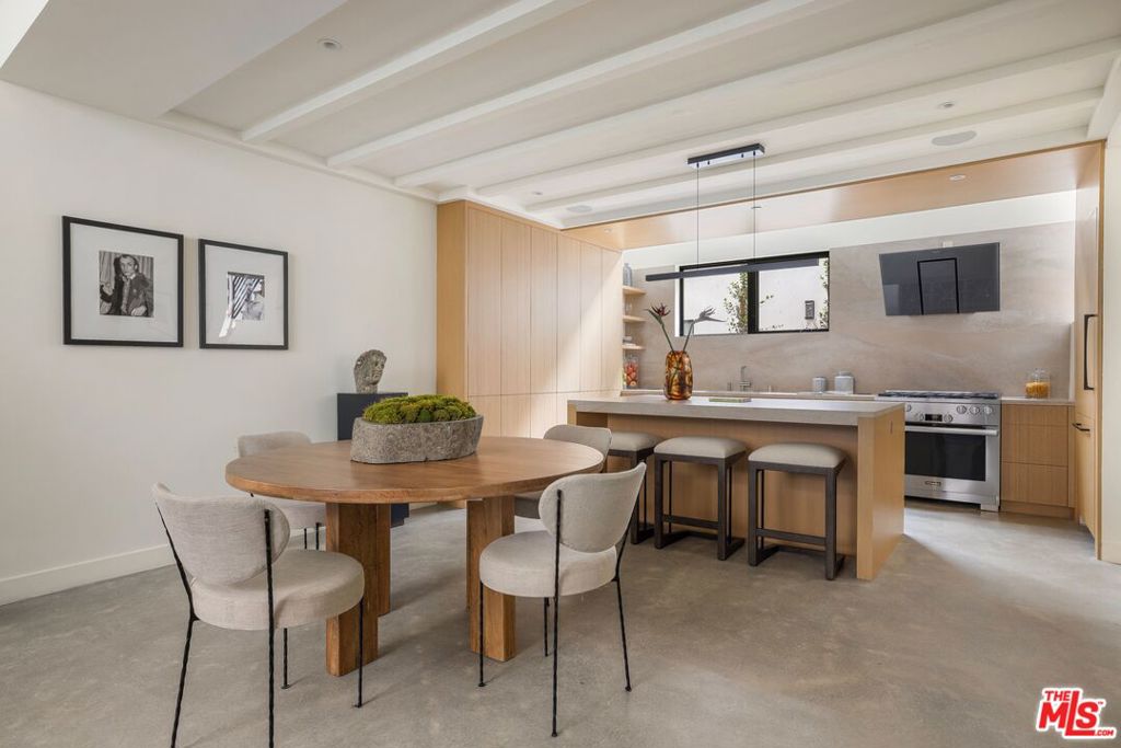 Experience luxurious living in the heart of West Hollywood's prestigious Norma Triangle neighborhood within these stunning contemporary residences. Designed by renowned ANR Signature, these single new builds offer a modern take on urban living, complete with private rooftop decks boasting breathtaking views of the city skyline and downtown. With two distinct design palettes inspired by artists Brice Marden and Robert Ryman, these two to three bedroom homes are truly masterpieces of modern living. Inside these gated residences, discover meticulously designed interiors with high ceilings and premium finishes throughout. Southern homes offer expansive living areas with soaring ceilings, mezzanine levels, and loft spaces. Kitchens are equipped with top-of-the-line Miele appliances, complemented by European Oak cabinetry and honed concrete or oak flooring. Primary bathrooms feature spa-like wet room designs with clerestory windows. Smart home technology ready adds ease.The spacious primary suites boast finished walk-in closets and luxurious bathrooms with high ceilings and ample natural light. The guest bedroom is thoughtfully designed, with bonus spaces ideal for creative pursuits. Enjoy your own private rooftop deck, perfect for entertaining or enjoying quiet evenings overlooking the city. The home also features a direct access garage with car lift.Situated moments from the Sunset Strip, West Hollywood Park, Pacific Design Center, and the vibrant Melrose shopping district, residents enjoy easy access to the best dining, retail, and entertainment options the area has to offer. West Hollywood Elementary School is also nearby.