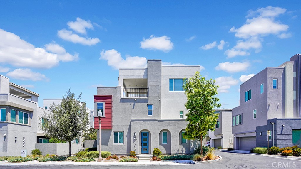 Beautifully designed 3-story corner detached home in the sought-after Great Park, Irvine. The open floor plan features a spacious kitchen with a large island, quartz countertops, and a bright, inviting living area. The first floor offers a powder room, direct garage access, and a private backyard. All 4 bedrooms and 2 full baths are located on the second floor. The third-floor bonus room—complete with a half bath and covered balcony—serves as a versatile indoor/outdoor space, perfect for a playroom, home office, or entertaining. Experience the award-winning Great Park lifestyle: walk to Cup Coffee for your morning brew, relax at The Garage community center or rooftop terrace, take a dip in resort-style pools and spas, or enjoy parks, playgrounds, BBQs, sports courts, and miles of scenic biking and walking trails. All just minutes from Irvine Spectrum, Fashion Island, and John Wayne Airport.
