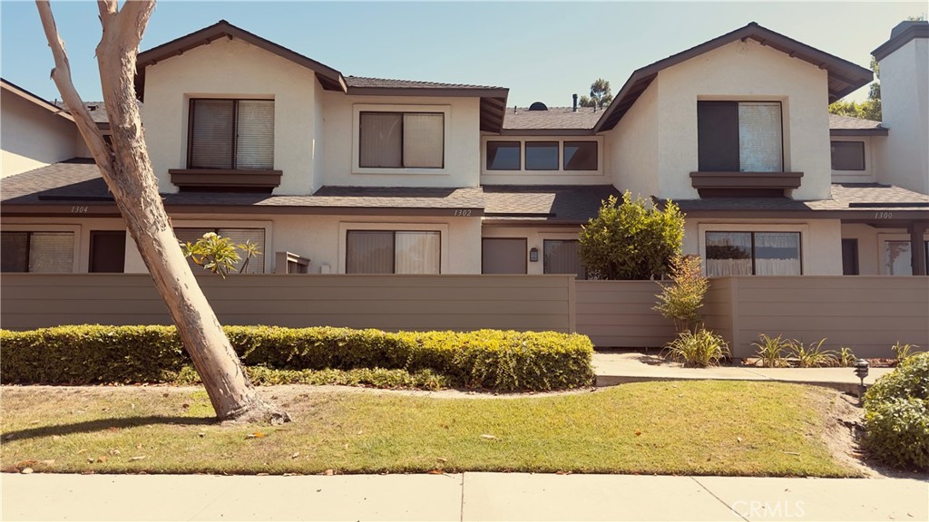 These townhomes rarely come up and are highly desired. Stylish Two-Bedroom Townhome in the Highly Desirable Lakeview Townhomes Community!
Step into this bright, airy, and beautifully updated two-story home in the heart of Anaheim! With soaring vaulted ceilings and abundant natural light, the open-concept living and dining areas create the perfect setting for everyday comfort and entertaining. The upgraded kitchen shines with elegant cabinetry, recessed lighting, and generous counter space—an ideal blend of style and function.
Upstairs, you’ll discover two spacious bedrooms, including a serene primary suite with a large closet and plenty of storage. Thoughtful designer touches throughout, including a color-coordinated stair rail that complements the kitchen palette. Even more storage is available in the attached two-car garage, featuring an insulated, upgraded garage door.
Enjoy California sunshine on your private, gated front patio—beautifully enhanced with charming brick pavers for added curb appeal and outdoor enjoyment. Community Perks You'll Love: Resort-style pool & spa, Scenic greenbelts & lush landscaping,Peaceful private lake and peaceful brook nearby
Prime Location! Minutes to the 91 Freeway, top-rated shopping, dining, and attractions including Disneyland, Knott’s Berry Farm, and the trendy Anaheim Packing District.
This is the home you’ve been waiting for—don’t miss your chance to own a gem in Lakeview Townhomes!