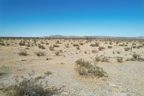 Photo of 55 La Paz Ave, Adelanto, CA 92301 (MLS # CV25071348)