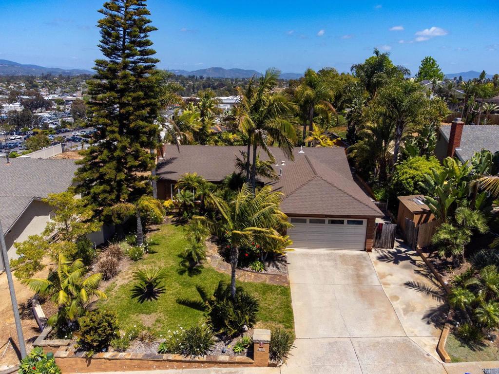 Welcome to your tropical oasis in one of the more desired locations in Encinitas. This roomy 3 Bdrm 2 Ba home has so much to enjoy. Larger bedrooms, open living space with a beautiful picture window facing west. Dining area large enough for big family gatherings. Kitchen cabinets and appliances were upgraded. Both baths were fully upgraded, new tile, tub and hardware. Hardwood flooring main areas and carpet in the bedrooms. Anderson wood frame windows. The backyard is very private with panoramic views to the east. Built in BBQ, with refrigerator as well as outdoor dining under the palapa cover. Running water feature and an outdoor fireplace. In addition, there is an extra 10x 10 building currently used as a bedroom. This room can be anything you want. Side yard has room for a boat or RV. Additional storage units including a doll house, chicken or bunny coop and more units on the side yard as well. This is a useable 10,600 sq ft lot. Not to mention close to shopping, beaches, best rated elementary, middle and high school.