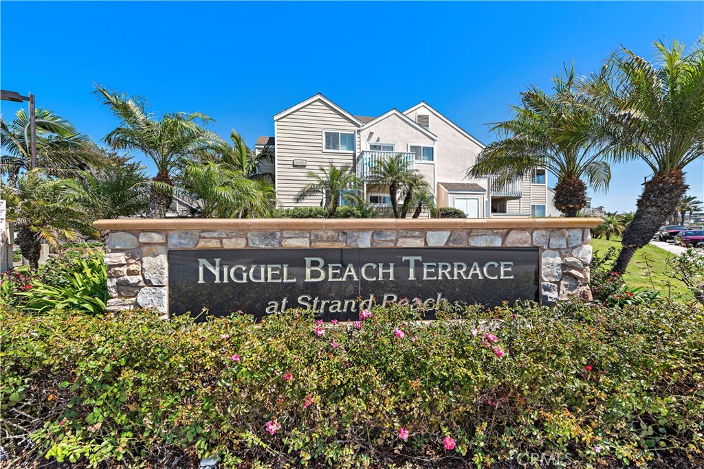 Delightful 2BR/2BA condo in Niguel Beach Terrace, directly across from Strands Beach. This ground-level home embraces indoor/outdoor living with a private patio that now features an outdoor kitchenette (converted from the former storage area)—ideal for entertaining. The unit was totally remodeled with shaker cabinet doors, soft-close drawers, upgraded fixtures, and slate flooring throughout, creating a stylish and durable coastal retreat. Offered fully furnished, it’s ready for an easy, turnkey move-in. Nestled in the coveted coastal enclave of Niguel Beach Terrace, the community’s lushly landscaped grounds and resort-style amenities—including a pool, two spas, and electric car charging stations—set the scene for relaxed beach living. Leave the car at home: Dana Point Harbor, the Lantern District, dining, shopping, and oceanfront walking trails are all an easy stroll away. Whether you’re seeking a primary residence, weekend escape, or investment, this condo delivers effortless SoCal coastal living in a premier location. Please note: Interior photos have been digitally staged. Existing furnishings are included in the sale.