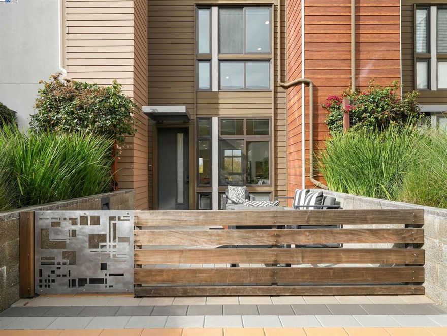 Modern luxury condo at Locale East Fremont, built in 2020 by SummerHill Homes. This 3BR/3.5BA, approx. 2,020 sq ft townhouse offers nearly $50K in upgrades. Features include a modern kitchen with oversized island, quartz counters, upgraded backsplash, and Bosch premium SS appliances. All bedrooms have ensuite bathrooms and walk-in closets. High ceilings on all levels, large windows with abundant natural light, recessed lighting, double-pane windows, and multi-zone central HVAC. HOA includes garbage, and exterior window cleaning. Community amenities: gym, outdoor BBQ, EV charging stations, bike lockers. Home includes 2 assigned underground parking spaces and a walk-in storage unit. Prime downtown location within walking distance to BART, groceries, and restaurants.