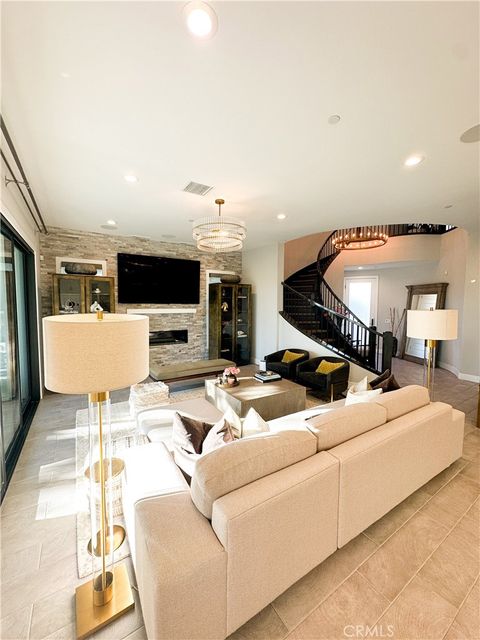 Photo of 12039 Estrella Place, Porter Ranch, CA 91326 (MLS # SB25191157)