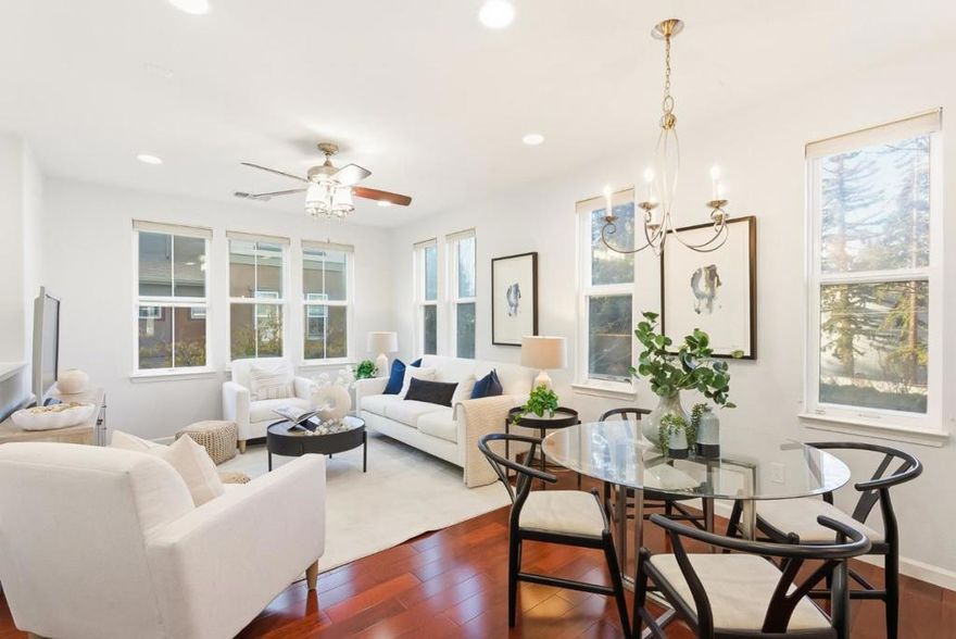 Welcome to Evelyn Glen, located in the heart of Sunnyvale surrounded by soaring Redwoods minutes from Downtown Sunnyvale and both new Apple campuses & CalTrain! Luxurious End Unit Townhome featuring extra windows on all levels that let in loads of natural light and a bedroom on the main level w/ a WIC and access to a full bath. Vibrant hardwood floors, high ceilings w/ recessed lighting, tall double pane windows, elegant tile features & more! Ground Floor features a bonus Family Room & Full Bath w/ floor to ceiling elegant tiles. Open Great Room concept with Living Room, Dining Room and Kitchen combo. Luxurious Kitchen complete w/breakfast bar, stainless steel appliances, large pantry & granite counters. Spacious Owners Suite w/ WIC & en-suite bath w/ dual sinks. Jr Suite also located on upper level w/extra windows, en-suite bath & large closet. Laundry is conveniently located on the upper level. Private patio, great for BBQ's. Lower HOA w/Clubhouse, playground, open field and more! Minutes from newly built Downtown Sunnyvale w/ loads of restaurants, Whole Foods, AMC, Target and more! Short drive to CalTrain, El Camino Real, Central Expressway, Lawrence Expressway, and 101. Easy access to the major companies such as both Apple Campuses, Nvidia, Amazon and Google. Don't miss out!