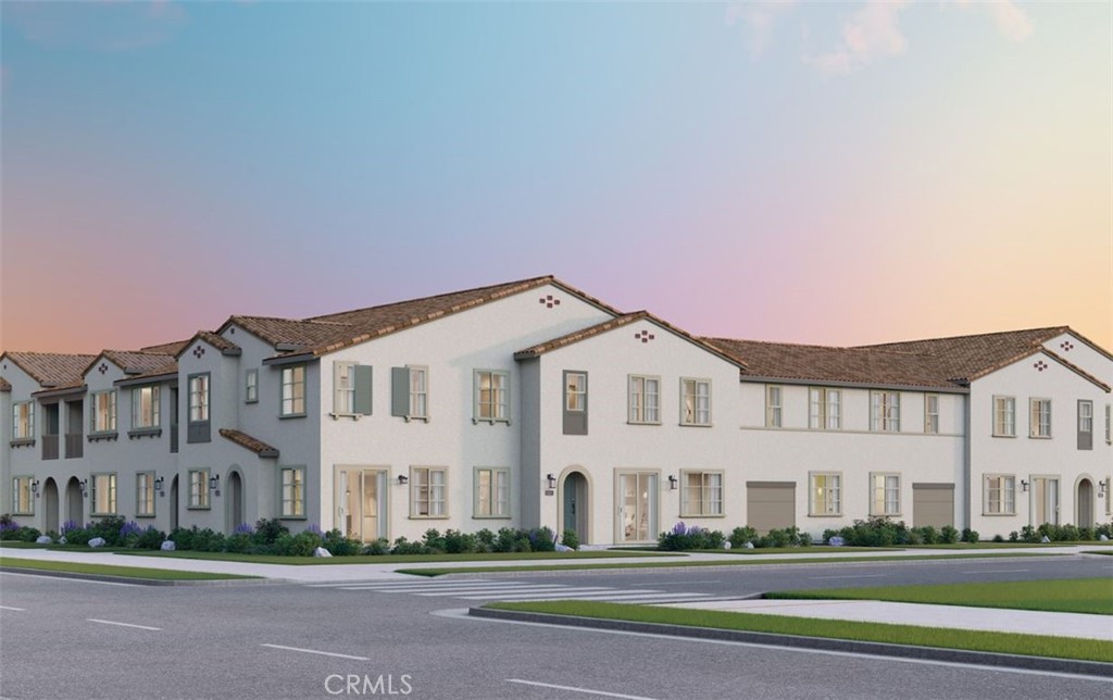 Ready in January New Townhome in Award-Winning New Haven! Enjoy resort-style amenities and take advantage of a special lower rate on this home. Don’t miss this opportunity. Discover your dream home in this BRAND NEW townhome nestled within the award-winning community. This exquisite residence at Row Plan 1, Homesite 70 awaits your arrival.  Experience luxury living at New Haven.  Quartz countertops, a designer-selected tile backsplash, and a premium stainless steel Whirlpool appliance package. Every detail has been fully upgraded for a truly exceptional home. Live the benefits of buying brand new: a builder warranty, energy efficiency, and included smart home features. This home is perfectly located with easy access to shopping, new schools, Southern California’s major freeways, and Ontario International Airport. New Haven residents enjoy resort-style amenities, including two indoor clubhouses, open-air clubhouses, six sparkling swimming pools, three jacuzzis, a kids' splash zone, pickleball and basketball courts, BBQ pavilions, firepits, playgrounds with a zipline, and more! An on-site lifestyle director ensures a vibrant community atmosphere. Plus, you're just steps from New Haven Marketplace, where you can indulge in restaurants, a brewery, yoga, and shopping. Ask about our special financing for this home!  Make homeownership a reality in this exceptional community. Your new life at New Haven awaits!