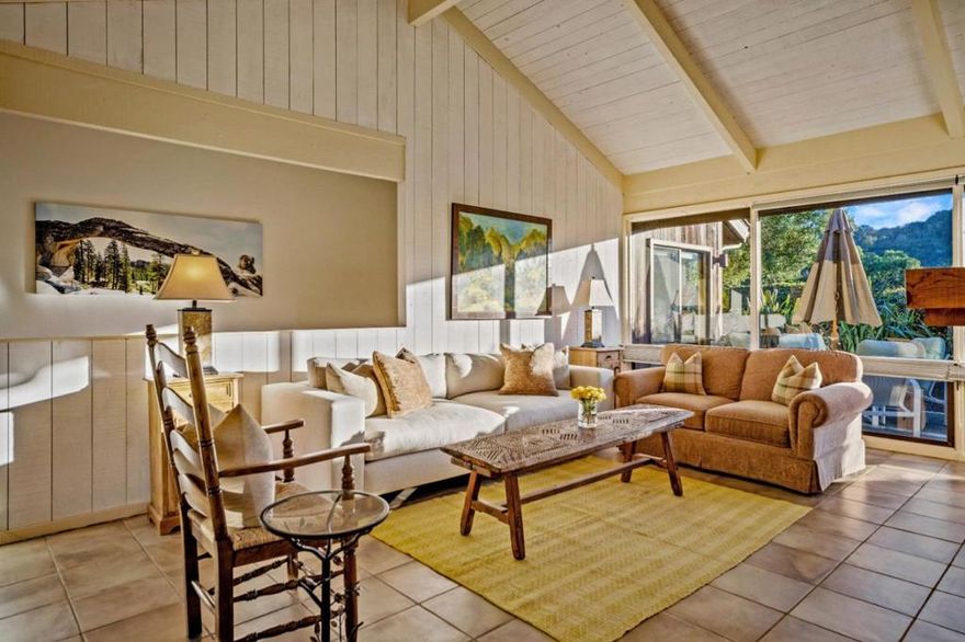 Welcome to this beautifully maintained single-level condo in the sunny Quail Lodge community of Carmel, CA. This inviting 2-bedroom, 2-bath condo offers an open layout with high ceilings and abundant natural light. Enjoy rare privacy with a charming front patio and a wrap-around back patio surrounded by lush landscaping. The sunny, south-facing patio, set along the 8th tee, offers a tranquil place to unwind with views of the Santa Lucia Mountains.  Inside, the thoughtful design offers a perfect blend of comfort and convenience, making everyday living feel easy and refined. The home is ideal for full-time residents or those seeking a tranquil retreat. Located just minutes from downtown Carmel and steps from world-class golf and scenic walking trails, this premier community is perfect for outdoor enthusiasts.