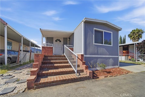 Photo of 10701 Cedar Ave AVE #217, Bloomington, CA 92316 (MLS # IG26130460)