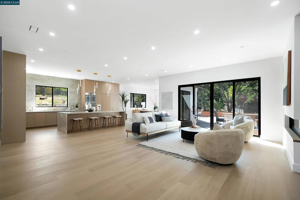 Modern luxury meets East Bay ease at 1080 Scots Ln—new construction with a sun-filled open layout, 4BD/3.5BA, ~4,100± sq ft, and bespoke finishes: Brazilian white-oak floors, custom cabinetry, and expansive Andersen glass. The chef’s kitchen impresses with pro-grade appliances, a statement island, and effortless indoor-outdoor flow. Retreat to the serene primary suite with a marble wet room, soaking tub, and rainfall shower. Oversized sliders open to a California-ready yard—IPE deck, low-maintenance turf, and space to lounge or entertain. A detached 2BD/1BA ADU with full kitchen and private entrance adds flexible living for guests, multigenerational needs, or a polished home office. Energy-smart design with owned solar and upgraded insulation keeps comfort high and bills low. Minutes to Shell Ridge trails, top-rated schools, dining, and downtown Walnut Creek. Design-forward, move-in-ready luxury in one of the area’s most coveted pockets. Schedule your private tour today!