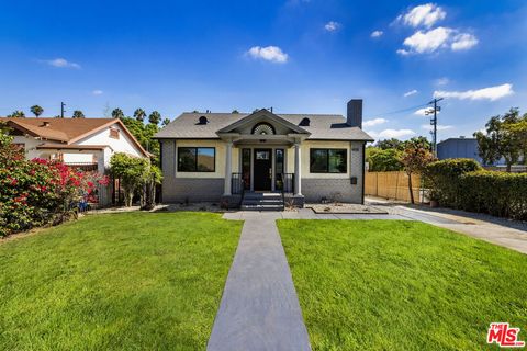 Photo of 4918 10th Avenue, Los Angeles, CA 90043 (MLS # 25601631)