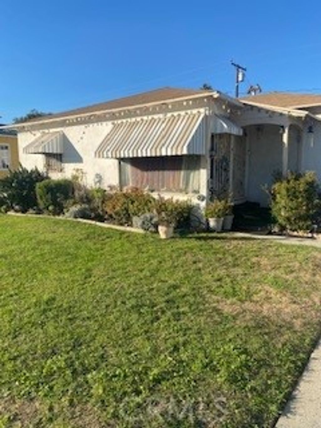 Photo of 1223 E 124th St, Los Angeles, CA 90059 (MLS # SW25282109)