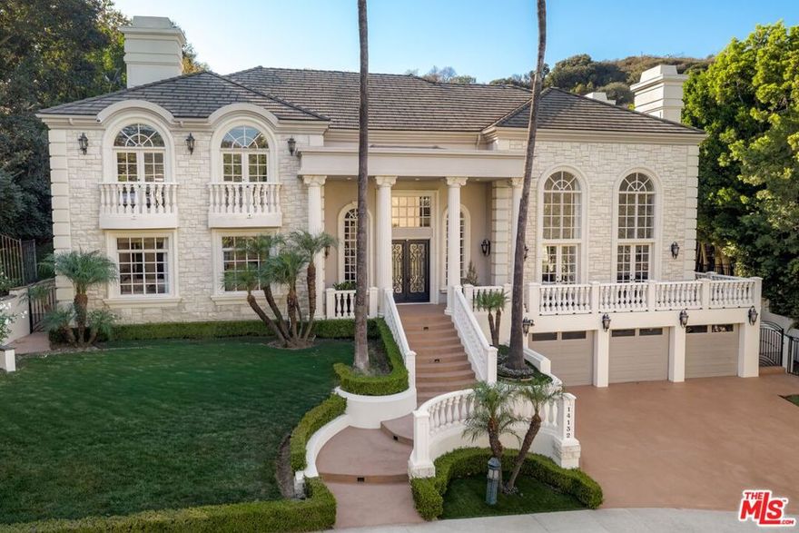 Set behind the gates of the exclusive Mulholland Estates, this grand residence combines timeless European architecture with resort-style living  now vacant, remodeled, and available for immediate showings. From its commanding faade with stone detailing, columned entry, and manicured grounds, to sweeping lawns and hillside views, this home stands as one of the community's most impressive offerings. Inside, soaring ceilings and light-filled interiors showcase elegant proportions and a refined, neutral palette. The formal living room is designed for both comfort and entertaining, with expansive windows, French doors opening to the pool terrace, a stately fireplace, and a sleek wet bar. The remodeled kitchen blends style and function with Caesarstone counters, designer glass tile backsplash, Viking 8-burner range, built-in oven and steamer, Sub-Zero refrigeration, and a generous breakfast area overlooking the gardens. The home's thoughtful floor plan features four bedrooms upstairs, including a dramatic primary suite with dual walk-in closets, dual bathrooms, a sitting lounge, and a two-sided fireplace. A fifth bedroom is located downstairs, while a versatile bonus room provides the option for a sixth bedroom, gym, or creative space. Additional highlights include a professional recording studio, recreation room with direct garage access, and seamless indoor-outdoor flow. The private backyard is a true retreat, complete with pool, spa, gazebo, lush landscaping, and an expansive lawn. A rare opportunity to acquire a beautifully remodeled estate in one of Los Angeles' most prestigious guard-gated communities.