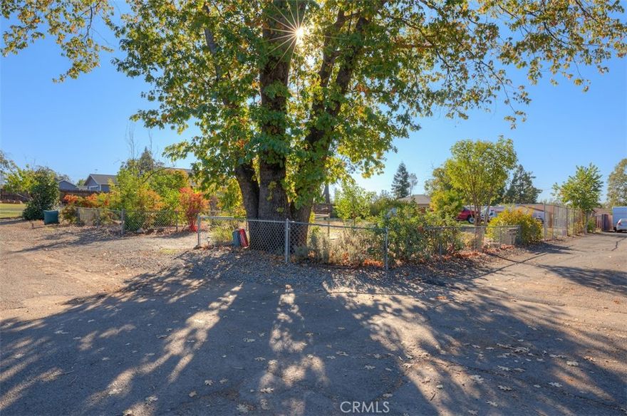 Welcome to 86 Sutter Road — a fantastic opportunity in desirable lower Paradise! This level lot offers a great blend of privacy, convenience, and potential. The property is fully fenced and features double gate entry. A large, mature oak tree provides abundant shade and a serene, park-like setting—perfect for relaxing or planning your future homesite.  You'll also appreciate the stucco oversized shed, ideal for storage, workshop use, or converting into a hobby space. Located in a sought-after lower Paradise neighborhood, this parcel offers a quick and easy commute to Chico while still enjoying the quiet charm of small-town living.  If you’ve been searching for a well-located, versatile property to build your dream home or invest in, this one checks all the boxes!