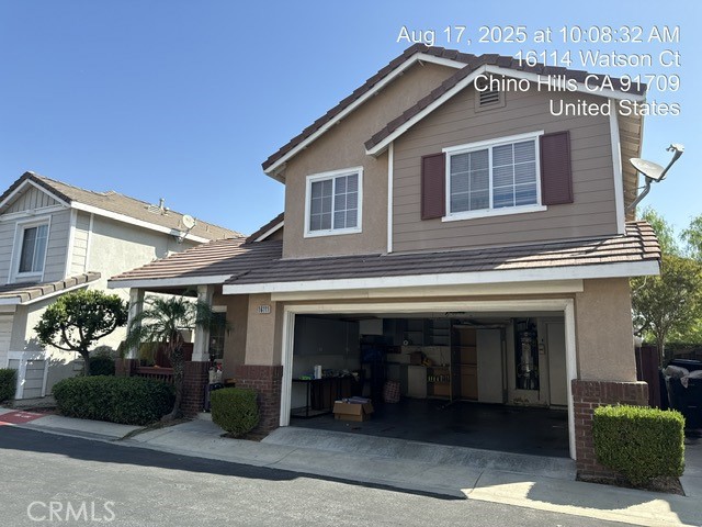 Located in a gated community, this home offers 3 bedrooms and 2.5 bathrooms with high ceilings and direct garage access. Conveniently within walking distance to shopping, trails, and Chino Hills High School, with easy access to freeways. Community amenities include a refreshing pool.