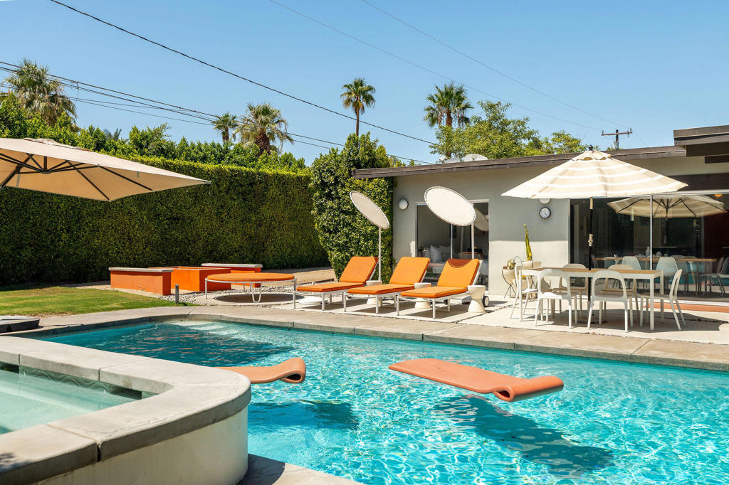 Iconic Midcentury Living in Palm Springs! Step into timeless style at this classic Meiselman-designed home, where clean midcentury lines meet effortless indoor-outdoor living. Walls of glass open to a sparkling pool and spa framed by soaring palms and dramatic western mountain views. Tall privacy hedges create a secluded resort-like setting, perfect for both relaxation and entertaining. Inside, open-concept living spaces flow seamlessly to the outdoors, showcasing the hallmarks of Meiselman architecture--post-and-beam ceilings, clerestory windows, and abundant natural light. Just minutes from downtown, this home embodies the Palm Springs lifestyle: chic, private, and made for sunshine living. No HOA and you OWN the land. At the time of listing, the Sunrise Park neighborhood is under the density cap, so short-term rental permits are available. This one is a great value, so schedule your private showing today!