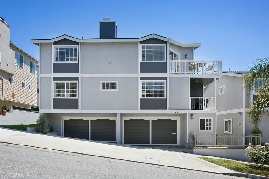 Stunning Coastal Retreat in Hermosa Beach



Welcome to your dream getaway at 458 Ocean View Dr, Hermosa Beach, CA 90254! This exquisite property offers a perfect blend of luxury, comfort, and breathtaking ocean views. Nestled in one of the most sought-after beach communities in Southern California, this home is just steps away from the sandy shores and vibrant local culture.



Property Highlights:



Spacious Living Areas: The open-concept design features expansive living spaces adorned with wide plank white oak flooring, providing both elegance and warmth. Large windows flood the interior with natural light and showcase stunning views of the Pacific Ocean.



Gourmet Kitchen: The modern kitchen is equipped with high-end appliances, ample counter space, and stylish cabinetry, making it a chef's paradise. Enjoy casual meals at the breakfast bar or host dinner parties in the elegant dining area.



Luxurious Bedrooms: This property boasts 5 spacious bedrooms, including a master suite that features a private balcony where you can enjoy morning coffee while watching the sunrise over the ocean. With 3.5 beautifully designed bathrooms, there is plenty of space for family and guests.



Four-Car Garage: A rare find in beach communities, the property includes a generous four-car garage, providing ample parking and storage space for your vehicles, beach gear, and more.



Outdoor Living: Step outside to your private oasis, complete with a spacious deck, perfect for sunbathing or alfresco dining. The beautifully landscaped yard provides a serene escape, ideal for gatherings or enjoying quiet evenings under the stars.



Prime Location: Located in the heart of Hermosa Beach, you'll have easy access to local shops, restaurants, and vibrant nightlife. Enjoy outdoor activities such as surfing, biking along the beachfront path, or simply strolling along the boardwalk.



This property is not just a home; it's a lifestyle. Experience the best of coastal living at this beautiful Hermosa Beach retreat. Contact us today to schedule a viewing and make this paradise your own!