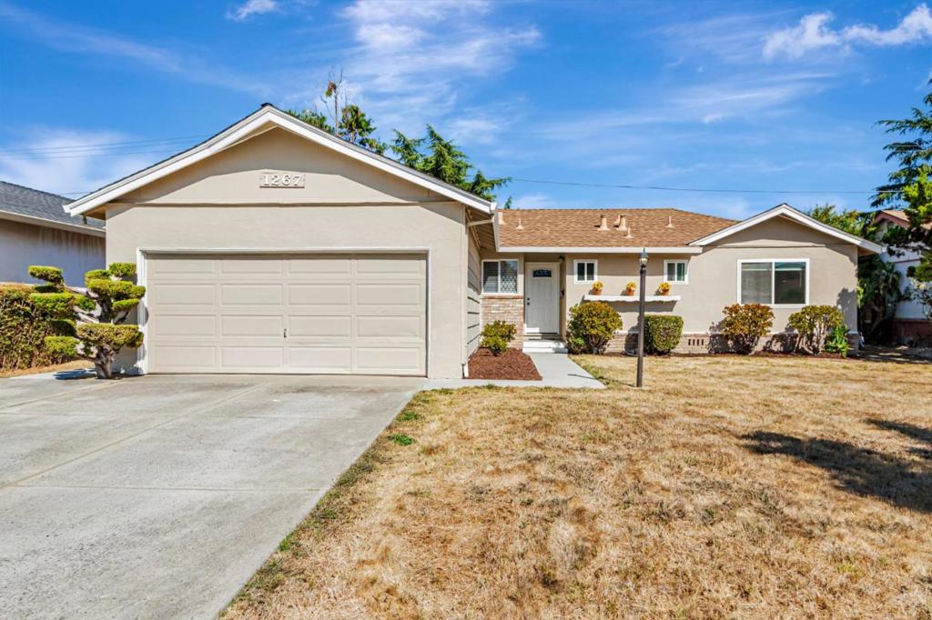 This delightful home offers an inviting and cozy living space featuring 4 spacious bedrooms and 2 full bathrooms. The centerpiece of the home is the charming kitchen, fully equipped with modern appliances, ample counter space, and a sunny breakfast nook perfect for leisurely mornings. The living area beckons with a warm and welcoming fireplace, an ideal spot for unwinding with a good book or hosting lively gatherings with friends and family. This property is situated on a generous lot of over 6,000 square feet, offering plenty of outdoor space for your enjoyment.