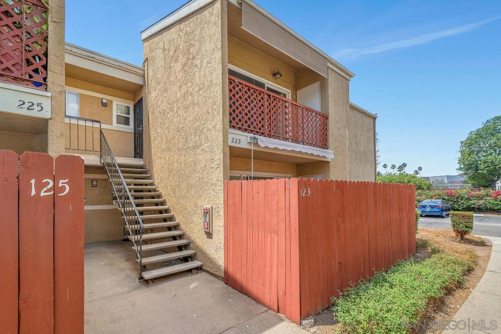 Spacious two-bedroom, one bath, second floor unit features vaulted ceilings in the living room, a large primary bedroom, with 2 closets and plenty of natural sunlight.Stacked washer and dryer and Refrigerator convey. Two designated parking spaces . The gated complex offers 2 pools a picnic area, an additional 24/7 on-site laundry facilities. HOA fee include water and trash located in the heart of Escondido. Close to shops, restaurants, easy access to 78 Freeway.