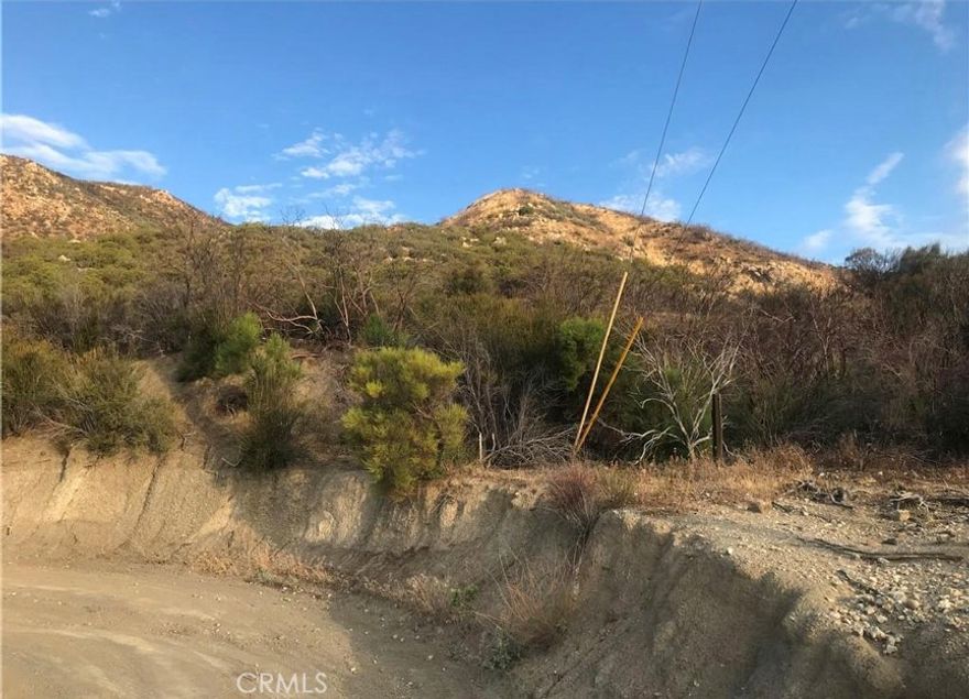 Seize a remarkable opportunity to own 2.21 acres of pristine land with electricity already on the lot, located on Gully View Drive in the serene city of Anza, California (APN 579-180-044). This expansive parcel, situated in a well area within the peaceful 92539 zip code, offers endless possibilities for development, investment, or creating your dream retreat. Surrounded by stunning natural beauty and panoramic views, this land combines tranquility with easy access to nearby amenities and outdoor activities. Don’t miss your chance to secure a piece of Anza’s idyllic setting and make your vision a reality on this exceptional parcel.****No soils reports, surveys, etc., have been done. Buyer and buyer's agent to verify all information with the city or county for allowable uses and requirements and rely on their own investigations. **Buyer responsible for checking zoning, utilities, permits and exact property boundaries. ****
