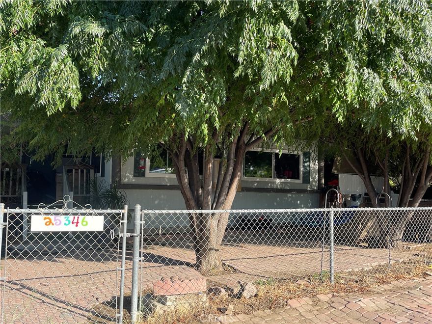 Charming Hemet Mobile Home on Owned Land! Discover this charming and spacious 2 bed,  2 bath mobile home on 7,405 sqft lot in Hemet. With 1,550 sqft of comfortable living space, this 1974 built home offers No HOA and has low taxes. The property includes permitted, free-standing workshop in the backyard. No permanent foundation, but can be discussed as a term of close of escrow. Enjoy a great location close to Soboba Casino, Diamond Valley Lake (fishing, hiking, biking trails), the Western Science Center, and other local attractions. The home is being sold AS-IS, giving buyers the opportunity to update and customize to their liking. A wonderful opportunity to own your land! Cash Investors are welcome!!!!