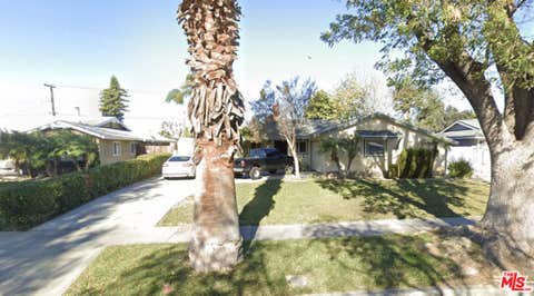 Photo of 8811 Delano Drive, Riverside, CA 92503 (MLS # 26855671)