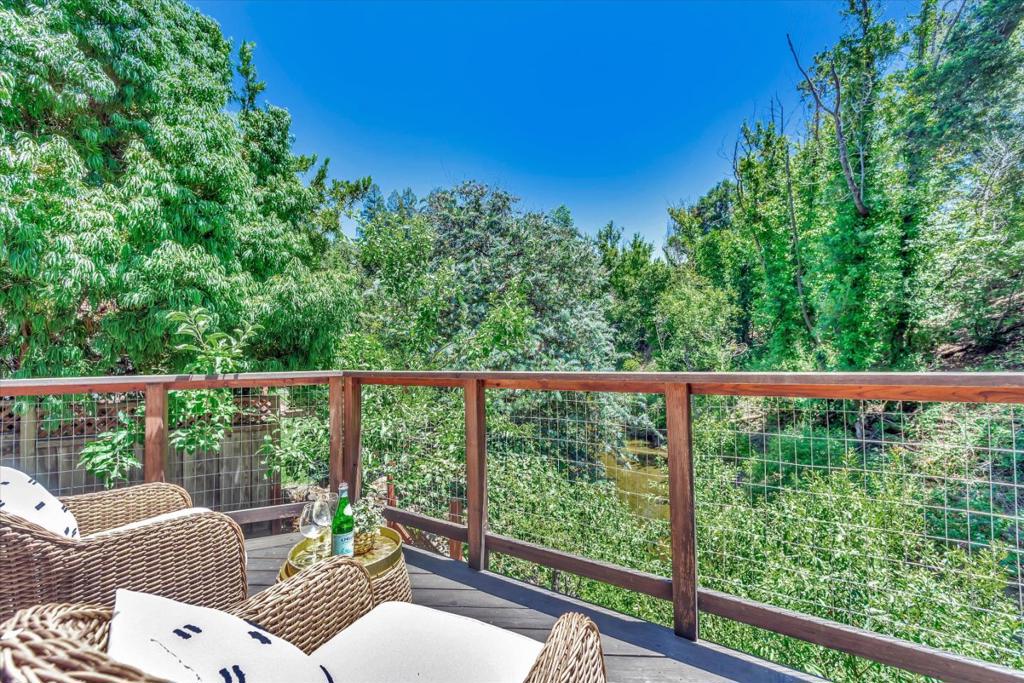 Extraordinary Creekside setting!!! Enjoy the sights and sounds of a home built on the banks of San Francisquito creek from sunrise to sunset. Zoned multi family. 2649 is a gorgeous three bedroom and two and one half bath home approx. 2170SF. In addition is 2647 a one bedroom one bath separate home approx. 625 sf. Designed by Victor Thompson, former Dean of Stanford's Dept of Architecture and built in 1992. Cedar Siding and Quality building materials throughout. New redwood Decks. The Main home 2649 Alpine is the perfect home designed for indoor-outdoor lifestyle and ideally located moments from Hwy 280, Stanford University & Shopping Center, lively Palo Alto and Menlo Park downtowns, hiking & bike trails and excellent Las Lomitas schools. Located on a private cul-de-sac, the home with expansive decks surrounded by luscious greenery is truly an idyllic setting. All upper level rooms feature high ceilings, large glass doors access and windows to the decks overlooking the creek. Clerestory windows and skylights fill the house with natural light, enhancing the home's indoor-outdoor living concept. Both homes have attached enclosed garages including additional guest parking. Vacant and Easy to show.