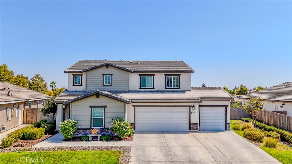 Welcome to 2104 Redding Way, located in the highly desirable gated community of Bell Crossing in Atwater. Built in 2020, this like-new residence offers a blend of modern design & functionality along with PAID SOLAR. This Next Gen home features 5 bedrooms, 3.5 bathrooms, and a 3-car garage. The spacious floor plan includes an open-concept living area, large loft, and flexible spaces designed to fit a variety of lifestyles. The kitchen is appointed with quartz countertops, custom backsplash, and ample cabinetry, all overlooking the main living and dining areas. Wood-like tile flooring throughout the home adds a touch of elegance and durability. Upstairs, the expansive loft provides additional living space, perfect for a media room, office, or play area. The primary suite offers comfort and privacy with a generously sized bathroom and walk-in closet. The backyard is beautifully finished with stamped concrete, ideal for outdoor entertaining and low-maintenance enjoyment. Bell Crossing offers a welcoming neighborhood atmosphere with parks and walking paths just steps away. Don't miss out on this gorgeous home. Schedule a private tour today!
