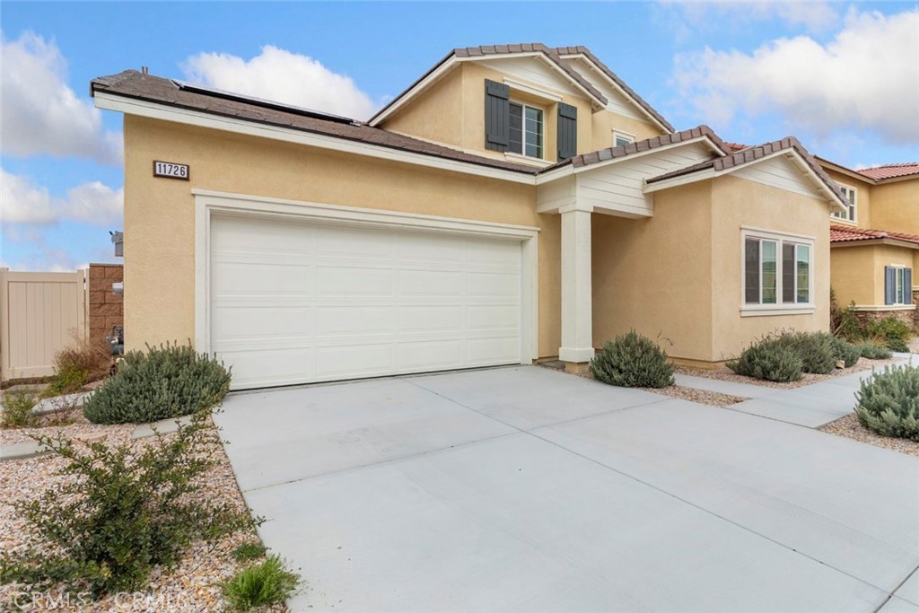 Fully Paid Solar * Dual Entry * NO HOA!! *
Sleek, smart and designed to impress. This new style Multi-Gen home blends luxury with versatility. A rare dual-entry layout includes a private downstairs suite with its own entrance, perfect for in-laws, long stay guests, or that independent teen. Inside the main home, an open-concept great room flows effortlessly into a designer kitchen with stainless steel appliances, custom cabinetry, and an over-sized island built for gatherings.
Upstairs, a generous loft, spacious bedrooms, and a dreamy primary suite with spa-style bath and walk-in closet await. Enjoy modern must-haves like smart home tech, tank-less water heater, recessed LED lighting, and fully paid solar system. Big backyard, bigger potential.
(Some of the images are virtually staged. Shows even better in person.)