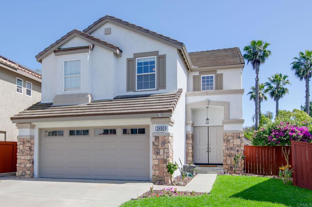 Welcome to 2490 Bear Rock Glen Located in the Stunning Guard-Gated Community of Emerald Heights! Drive through the community gates, and enjoy the endless ocean and mountain views on your way home! This beautifully upgraded home is impressive from the moment you enter! A dramatic slate-tile raised entry welcomes you into rich wood flooring throughout the downstairs, soaring ceilings and a sun-filled formal living room with a wall of windows flows effortlessly into the elegant formal dining area. The heart of the home is the stunning eat-in kitchen with a view to the backyard. Featuring granite slab countertops, JennAir stainless steel appliances and a spacious walk-in pantry. Adjacent is the cozy family room with a media niche and fireplace perfect for entertaining or relaxing. Upstairs features a primary suite that is a true retreat with a walk-in closet, dual vanities, a separate shower and huge soaking tub ideal for unwinding after a long day. 3 additional bedrooms with newer carpet upstairs, another full bathroom plus a permitted bonus room (23x13) which offers incredible flexibility as a large 5th bedroom, home office, or media/game room which you can see peak ocean views from! Step outside to one of the largest yards in the neighborhood, complete with a putting green, fire pit and gardening area! Low-maintenance landscaping plus an outdoor eating area and plenty of room to make it your own private oasis! The 481 Acre Community features a resort style clubhouse, Jr Olympic pool, spa, kiddie pool, updated gym, sports courts for tennis, pickleball, basketball, kids playground, picnic areas with BBQ, park area and numerous community events throughout the year! No Mello Roos and Low HOA Fee! This home is loaded with so much potential... Don’t miss out on this opportunity!