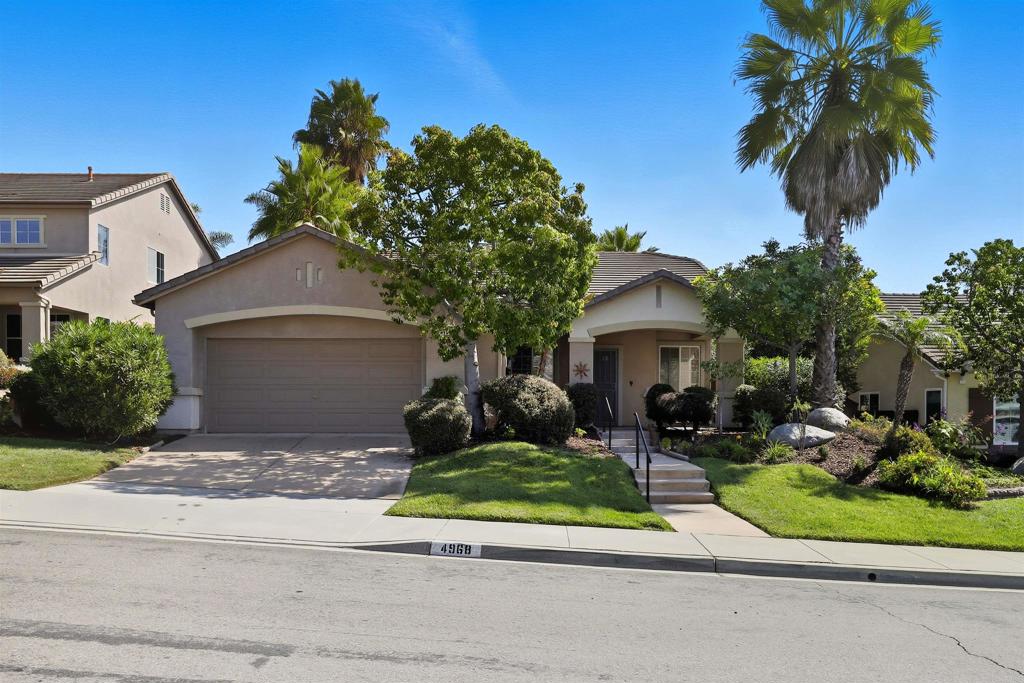 Just Listed! Charming single story offers 3 bedroom plus 4th room serving as a den or home office and two full bathrooms. Home has high ceilings and is filled with tons of natural sunlight. The kitchen and family room opens to a 16x12 sunroom where you can relax or entertain year-round. Enjoy brand new carpet, neutral tile in the kitchen, and laminate flooring in the bathrooms. The primary suite offers a walk-in shower, soaking tub, and walk-in closet. Lush landscaping surrounds both the front and backyards, offering privacy and a tranquil setting. Plus, the location couldn’t be better, just a short walk to Bonsall West Elementary and minutes from the San Luis Rey Gate of Camp Pendleton, back gate. Low HOA. Property sits on a cul-de-sac street.