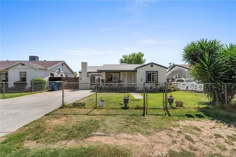 Photo of 303 El Tejon Ave, Bakersfield, CA 93308 (MLS # NS26075410)