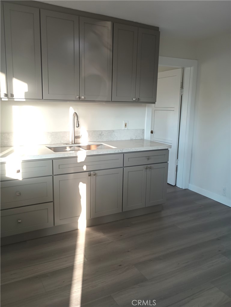 This is a small two-bedrooms, one bath apartment for rent in Pomona. The bathroom is in one of the rooms, so we are renting as one bedroom. It has been fully remodeled. Lower level, one enclosed car garage.