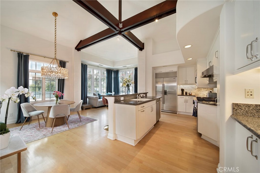EXPERIENCE AN EXQUISITE FURNISHED COASTAL RETREAT at this sophisticated, sun-drenched beach getaway. Nestled in the prestigious enclave of Corona Del Mar, this meticulously maintained 2-bedroom, 2-bathroom residence boasts high ceilings and charming French-paned windows. The ideal kitchen, featuring granite countertops and modern appliances, seamlessly opens to the spacious living and dining areas, which extend to a quintessential Southern California patio, perfect for outdoor living and entertaining. The expansive primary bedroom offers an ensuite bath and a generous walk-in closet, while the versatile second bedroom provides direct access to the inviting outdoor patio. Enjoy the convenience of inside laundry and a private entry courtyard. This exceptional home is just moments from the surf and sand, located in the coastal paradise of Corona Del Mar, mere minutes from downtown CDM, Newport Beach, Fashion Island, and John Wayne Airport. Revel in nearby fine dining and world-class resorts. Contact us for availability and rates.