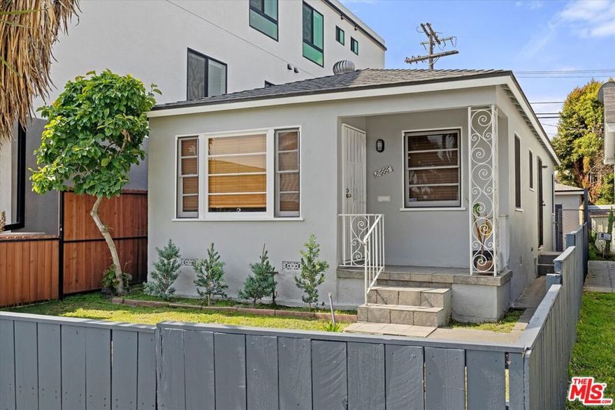 Welcome to 8666 Cadillac Avenue.  This cheerful 2-bedroom, 1-bathroom cottage is centrally located adjacent to the Beverlywood neighborhood.  Never hunt for parking with the detached, private one-car garage, along with an additional gated parking space on the property. The front yard with lawn is fenced-in, while the rear patio is perfect for outdoor relaxation and weekend BBQ's. Inside, you'll find hardwood floors, an open, updated kitchen, and the convenience of a washer/dryer in the mudroom. Unfurnished and ready for your personal touch, this home is a rare find in a sought-after location.      Please note: Virtual furniture staging has been used in the marketing of this property.  This property is being offered unfurnished (see non-staged photos).  Prospective tenants are advised to physically visit the property. The listing agent and brokerage do not guarantee the accuracy of the virtual staging and are not liable for any discrepancies between the virtual staging and the actual property condition.