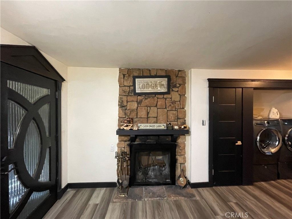Photo of 402 Holmes Ln, Sugarloaf, CA 92386 (MLS # IG26040603)
