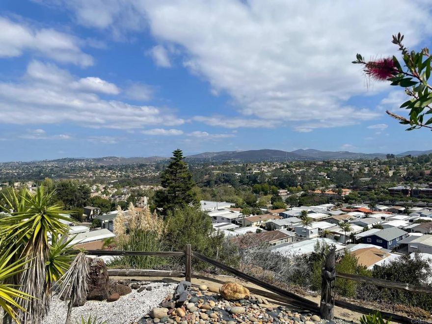 BEST VIEW LOT, of exceptional size, available within the highly sought after and desirable "land owned" 55+ community of Park Encinitas. Privately located at the end of the street on top of the hill, the panoramic views from two sides are unequaled! It may be the best buildable lot within East Encinitas, for the price. The majority of the value being in the land, the potential buyer will likely choose to remove the existing 1971 unit and place a new MFH on this exceptional property. Park Encinitas is on track to be one of the best real estate opportunities available in the North County coastal areas. Many people are beginning to understand and appreciate the major advancements in the MFH technology and quality. This beautiful community is going through a transition. Just drive around within the PE community to see examples of the many fine newer homes beginning to grow in numbers. Low HOA of only $275.00.