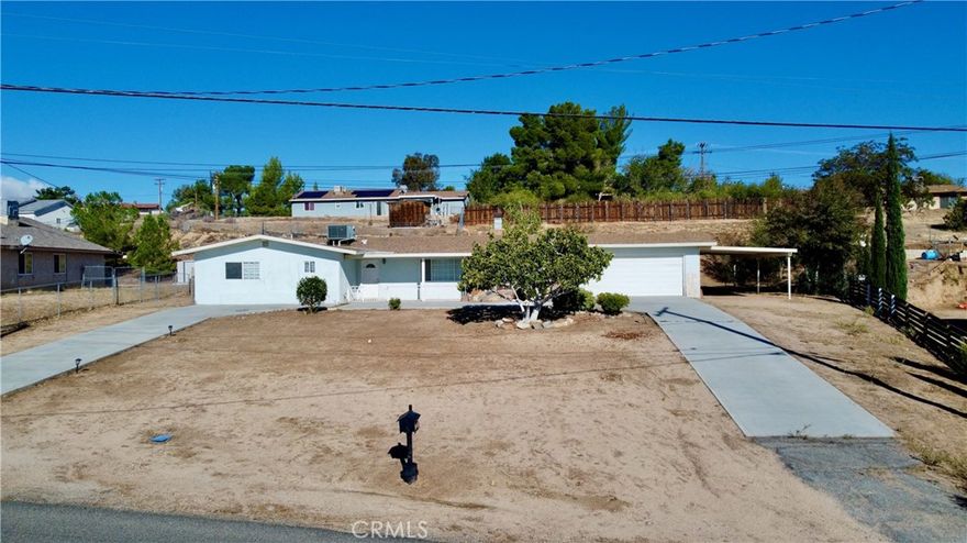 A charming single-story home set on a spacious half-ace lot. This 1,654 sq ft residence offers 3 comfortable bedrooms, 2 bathrooms, and a generous layout that includes multiple living areas and a cozy fireplace.  The property also features an additional outbuilding and a game room with power, providing extra space for hobbies, storage, or entertaining.  With a large lot, this home offers plenty of room for parking, outdoor living.  Great opportunity for Buyers to create more value - all in a quiet, established neighborhood close to schools, shopping, and commuter routes.  Call now for viewing.